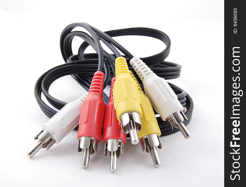 RCA cables on the white background. Narrow depth of field. RCA cables on the white background. Narrow depth of field.