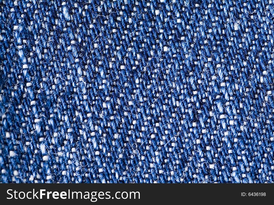 High resolution image of blue cotton denim fabric. High resolution image of blue cotton denim fabric