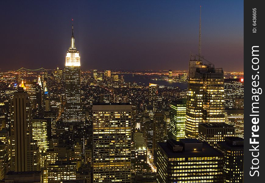 A view of New York City at night. A view of New York City at night