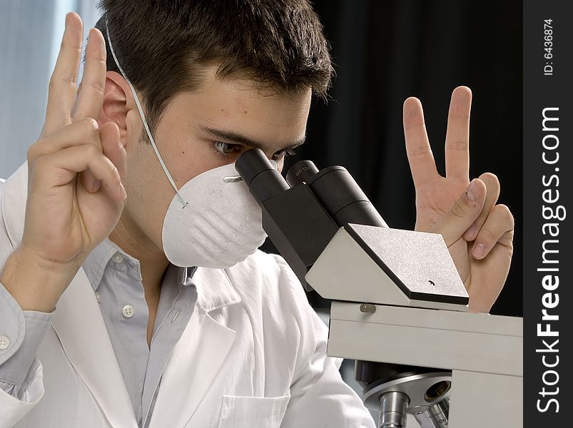 Scientist discovering something at the microscope, chemistry related or medical design. Scientist discovering something at the microscope, chemistry related or medical design