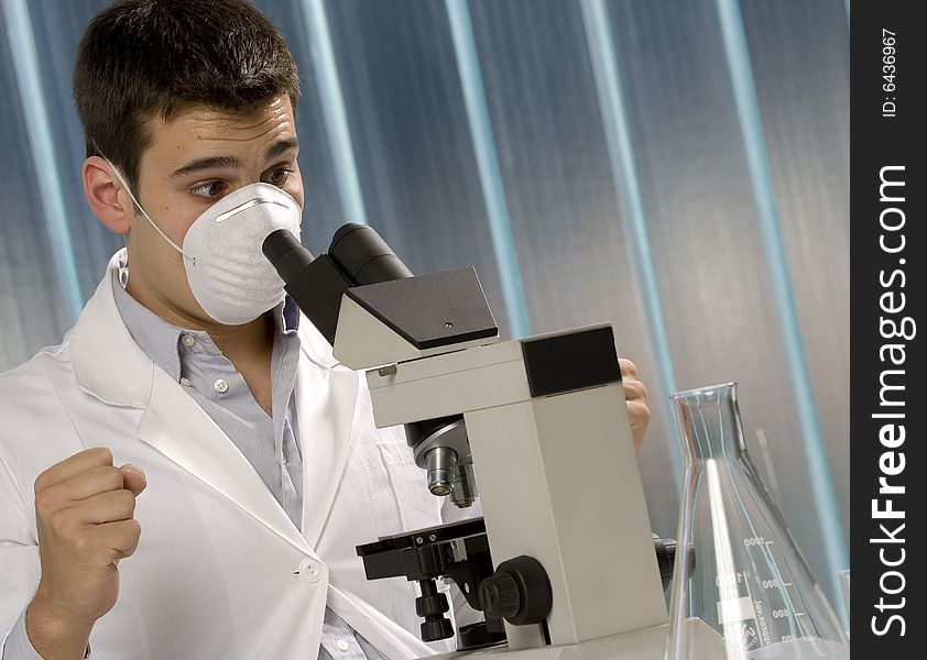 Scientist discovering something at the microscope, chemistry related or medical design. Scientist discovering something at the microscope, chemistry related or medical design