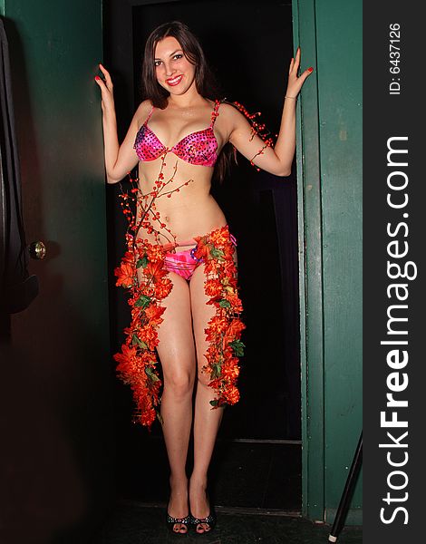 Fashion model/performer standing in doorway