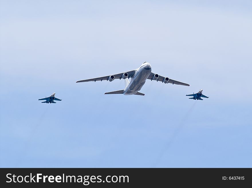 Military planes flying in the blue sky