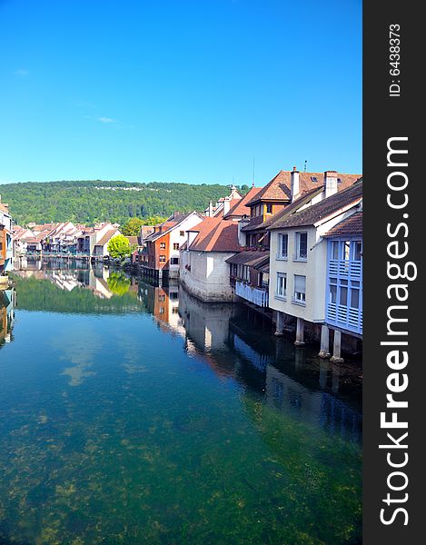 Beautiful little town at the Loue river in France. Beautiful little town at the Loue river in France