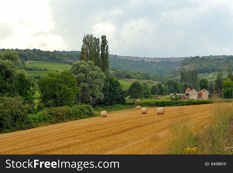 Bales of Hay in the fields at the French Alps