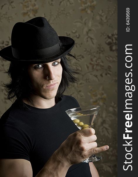 Young Man with a Dark Hat and Martini. Young Man with a Dark Hat and Martini