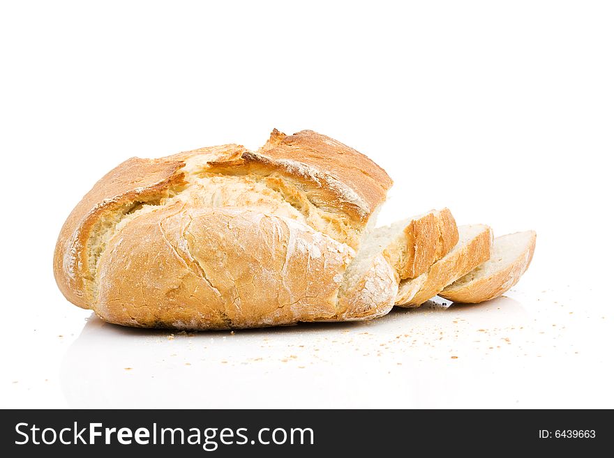 Home baked bread isolated on white