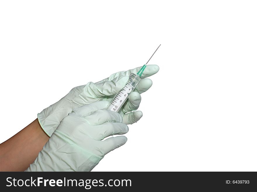 Hands in rubber gloves, hold a syringe. It is isolated, on a white background. Hands in rubber gloves, hold a syringe. It is isolated, on a white background
