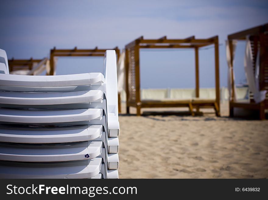 Beach deckchairs - seascape in the background