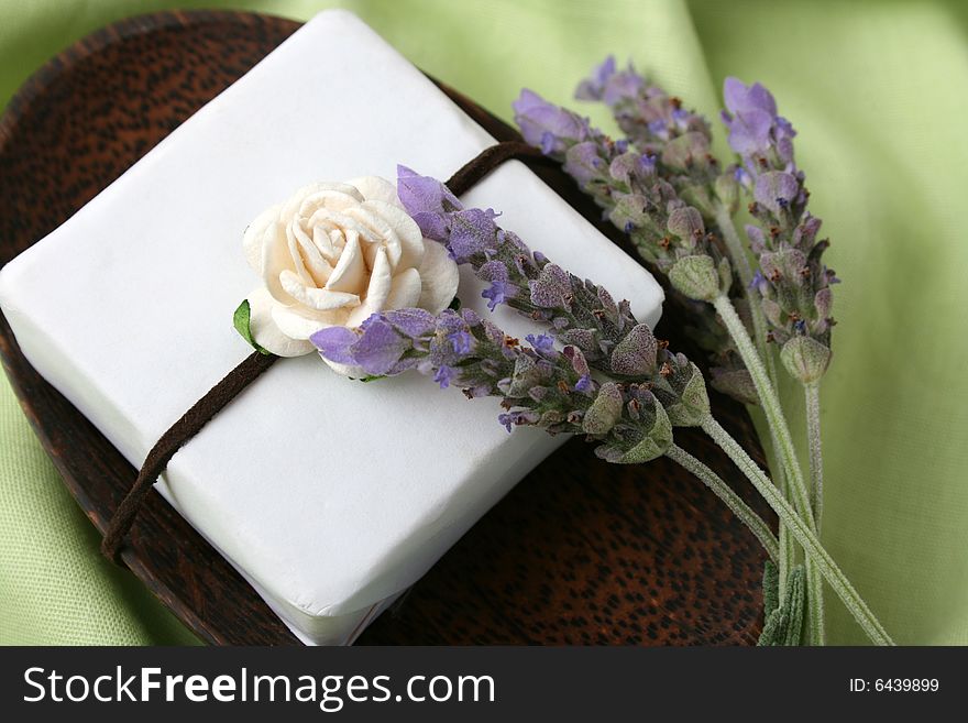 Soap Crate gift set wrapped in green, decorated with roses