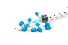 Pills And Syringe Stock Images