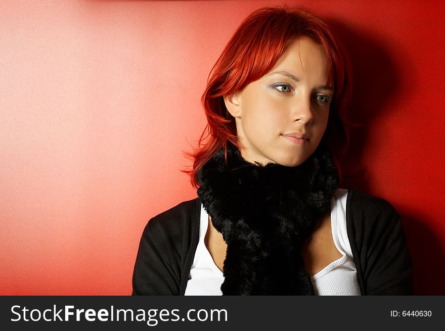 Young pretty woman over red background. Young pretty woman over red background