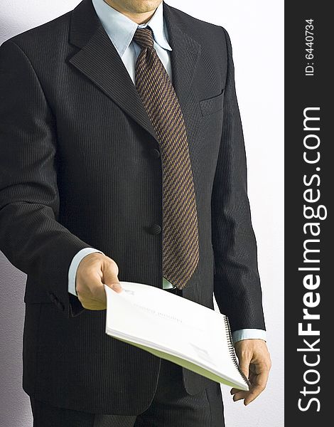 businessman showing a sheet of results