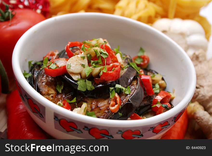 A fresh meal of aubergines with garlic and chili