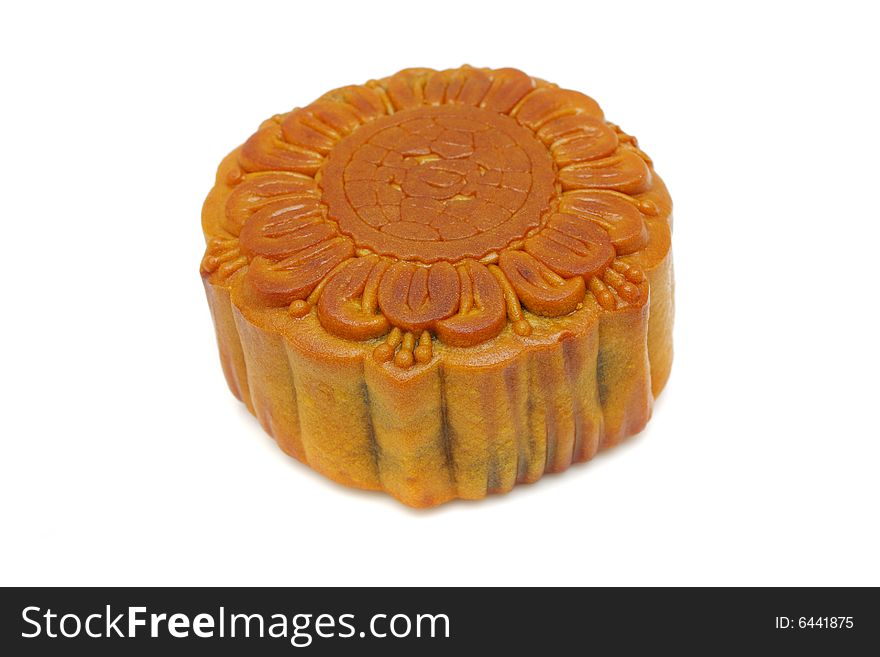 Close up of a moon cake over white background.