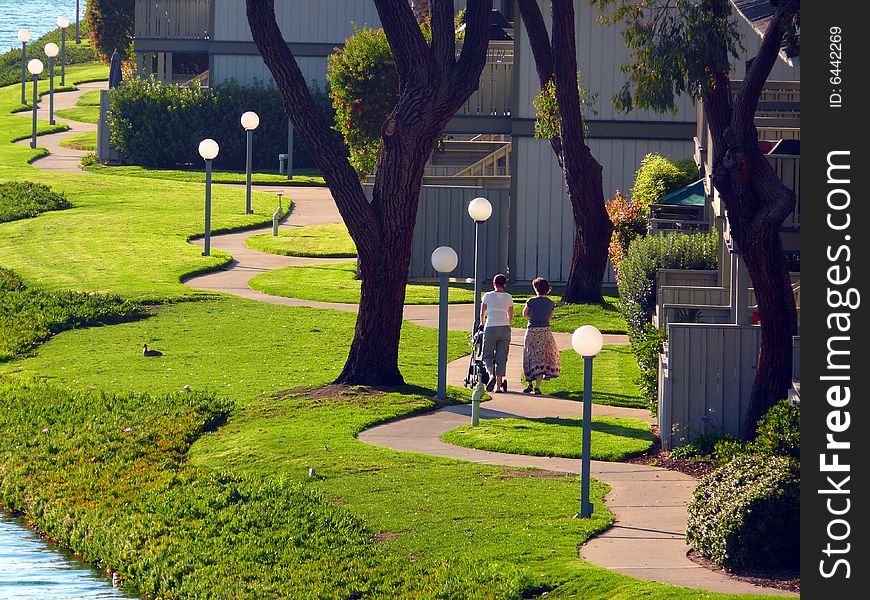 Two Women Pushing Stroller