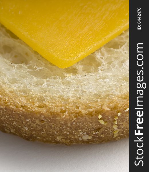 Partial Slice of Bread with cheese angle close up