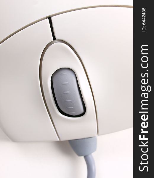 White Mouse top view with scroll wheel close up