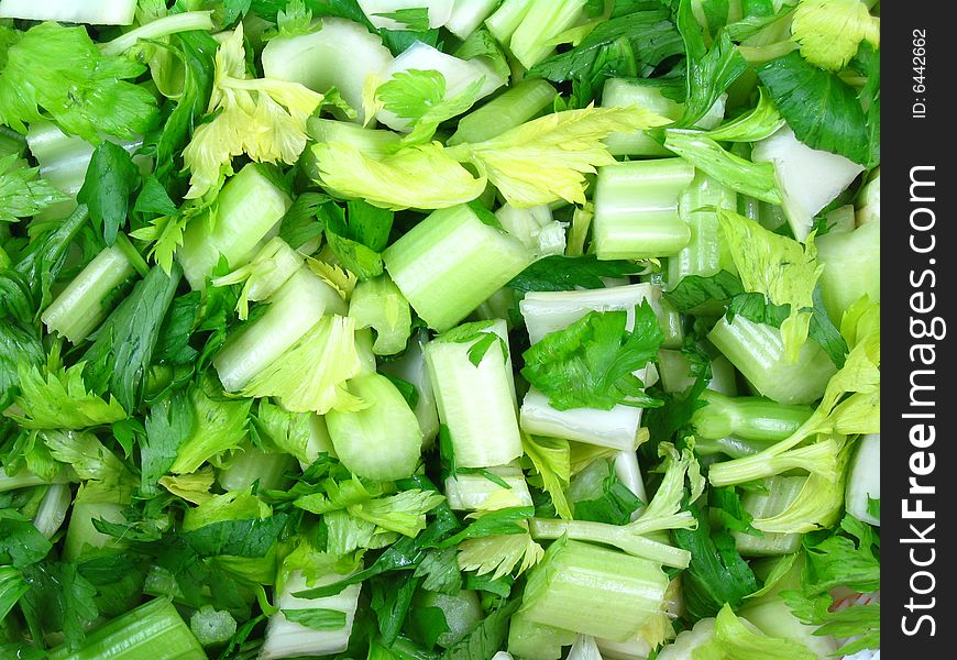 Close up of chopped celery leaves and stalks