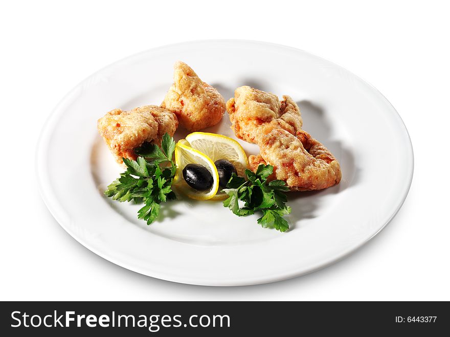 Seafood - Deep-Fried Shrimps in Bacon Dressed with Parsley, Olives and Lemon. Isolated on White Background