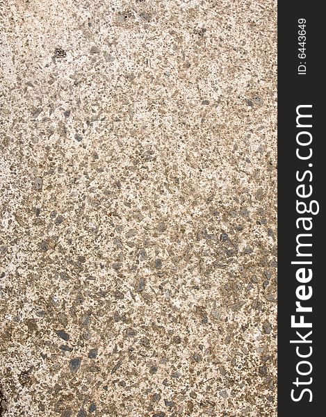 Image of the concrete ground and the material that make up the contrete.