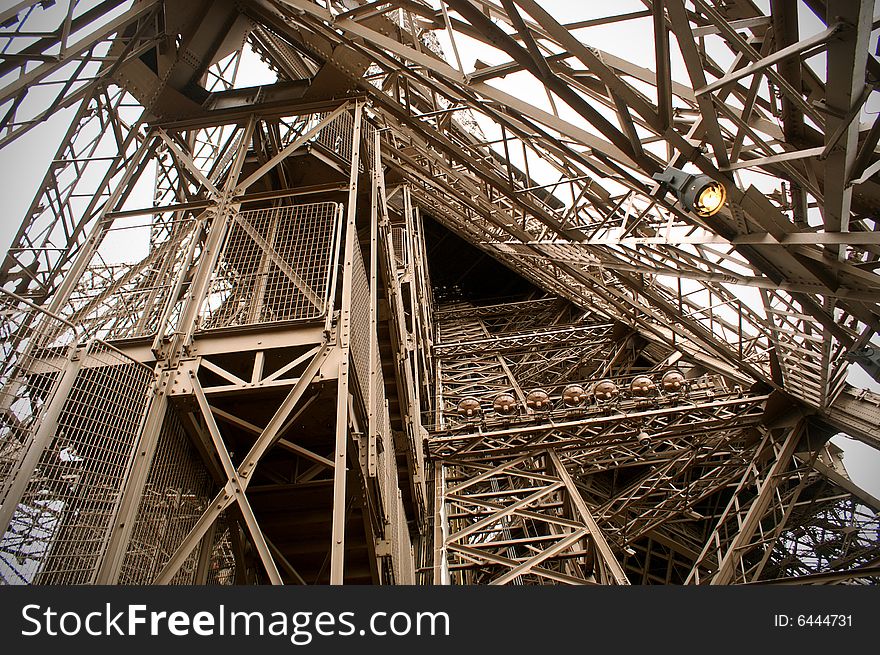 Iron and brown structure creating a triangular effect