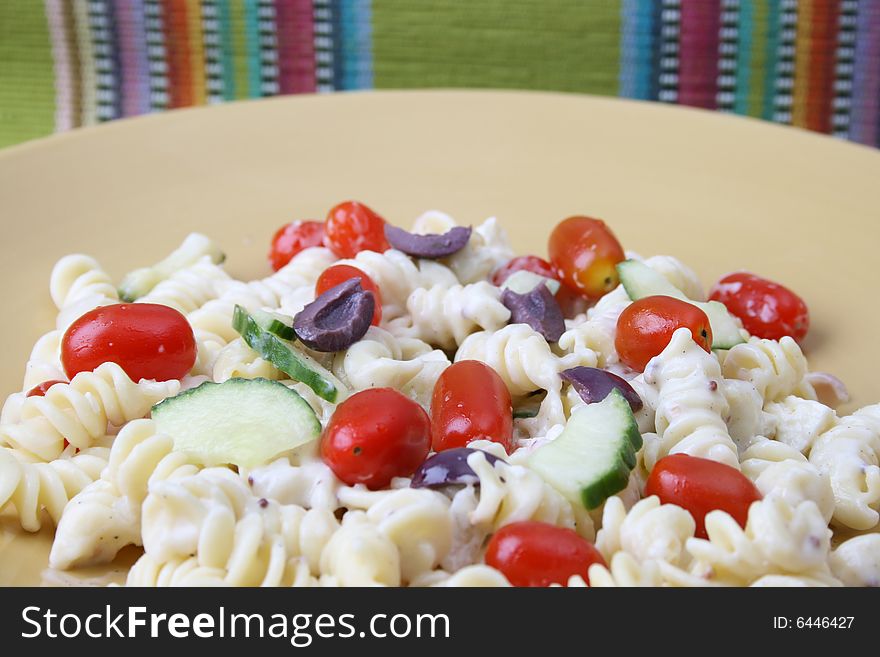 Cold Pasta Salad with tomatoes, cucumbers and olives