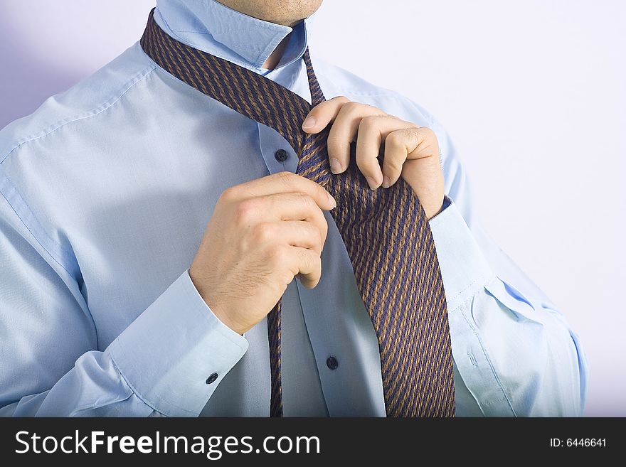 Businessman viewed by his tie knot