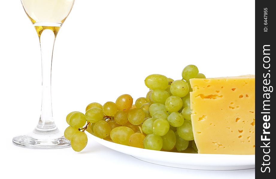 Cheese, grapes and wine isolated on a white background