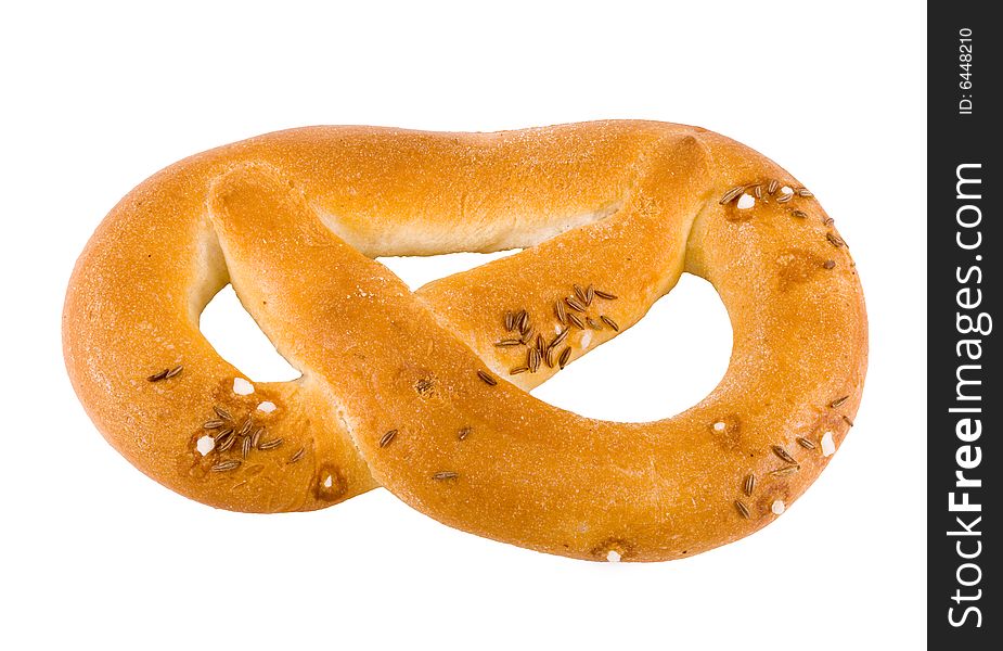 A salty crunchy pretzel on the white background