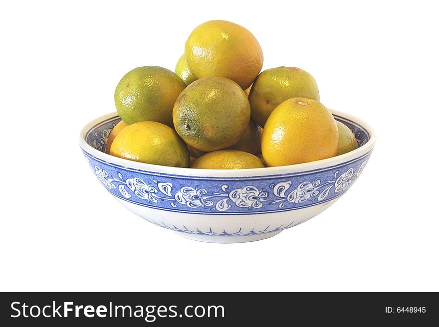 Ceramic bowl filled with oranges isolated with clipping path. Ceramic bowl filled with oranges isolated with clipping path