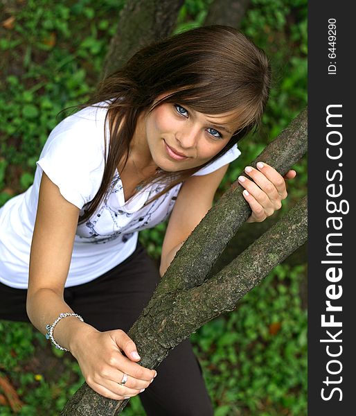The photo presents young caucasian girl looking at a lens of high resolution camera.
The picture was taken in a serene area among the trees. The photo presents young caucasian girl looking at a lens of high resolution camera.
The picture was taken in a serene area among the trees.