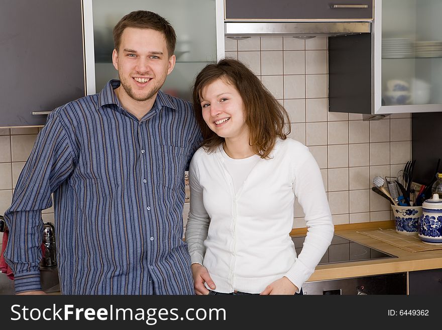 Happy couple together in kitchen. Happy couple together in kitchen