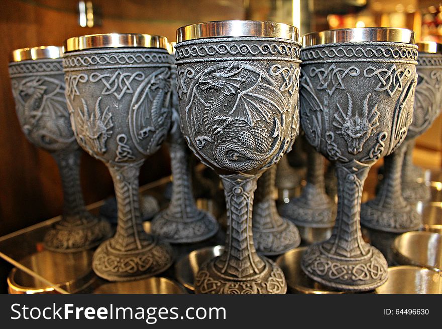 Cups decorated with dragons in a store