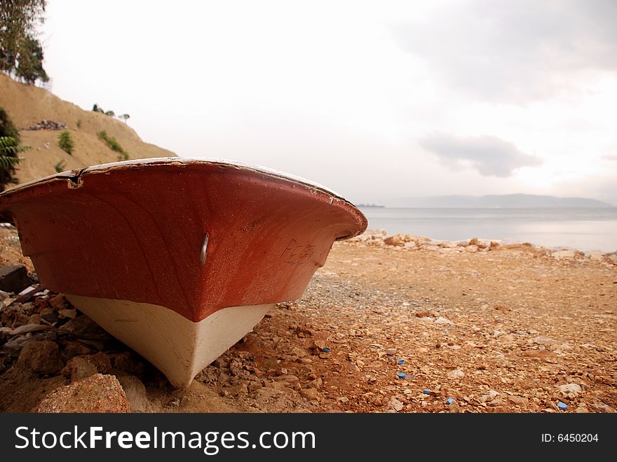 Old rowing boat and sea