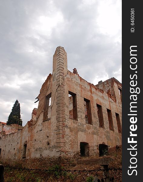 Old ruined building and cloudy sky