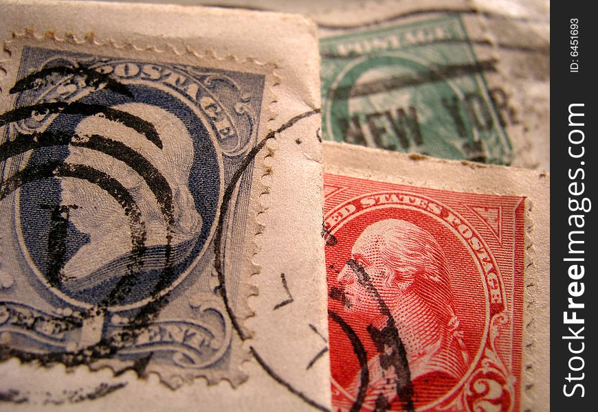 Close up of cancelled old stamps with cancel postmarks. Close up of cancelled old stamps with cancel postmarks.