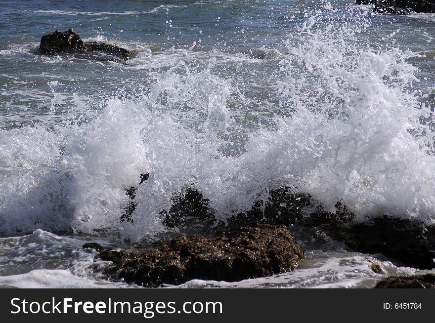 Wave splashing on the rocks