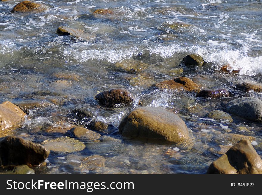 Wave splashing on the rocks