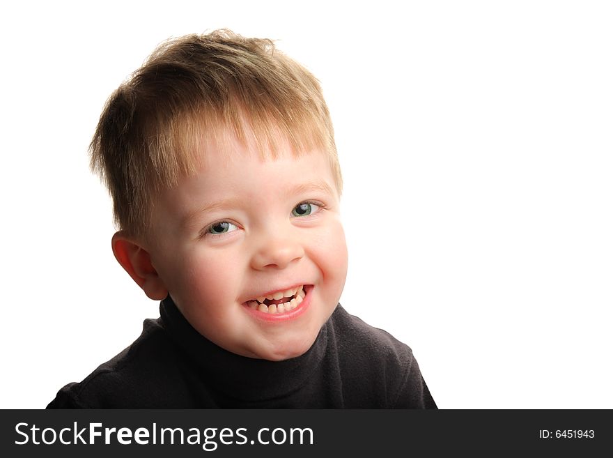 Cute young smiling boy with blond hair and green eyes, isolated on white