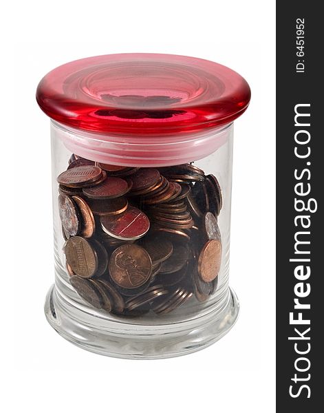 Pennies in jar with red top, isolated on white w/clipping path.