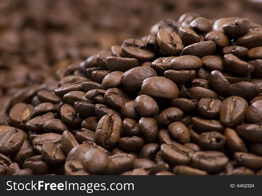 Close up of pile of coffee beans. Close up of pile of coffee beans