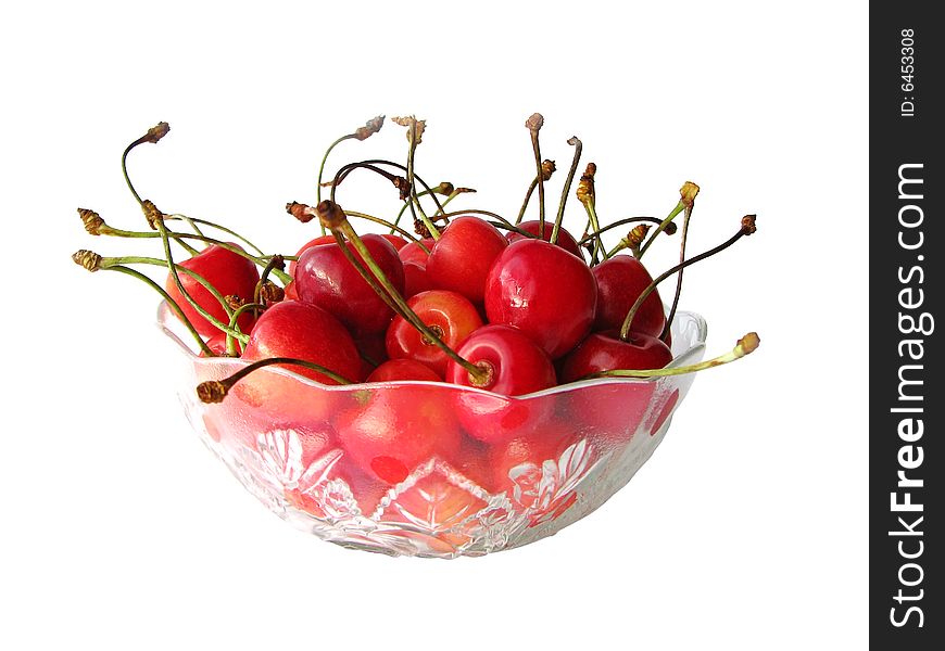 Isolated cherries in glass bowl