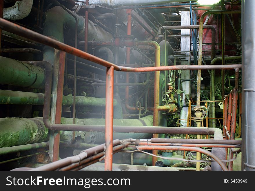 Pipes, tubes, machinery and steam turbine at a power plant