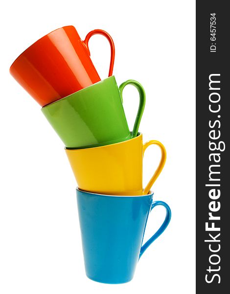 Multicolored cups in stack, isolated