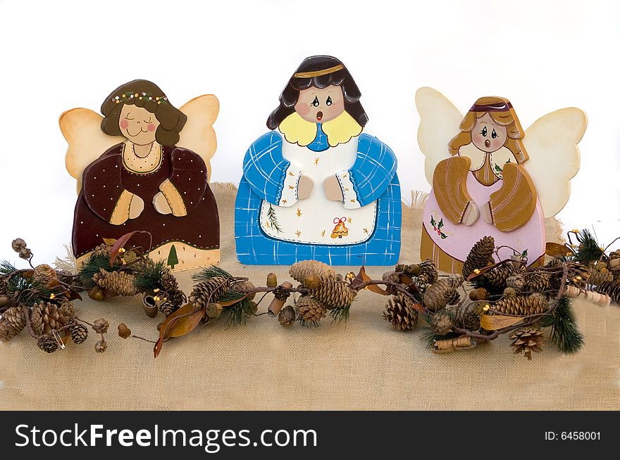 Three figurine christmas choir angels in wood