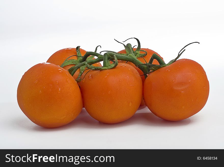 Juicy Tomatoes isolated over white. Juicy Tomatoes isolated over white