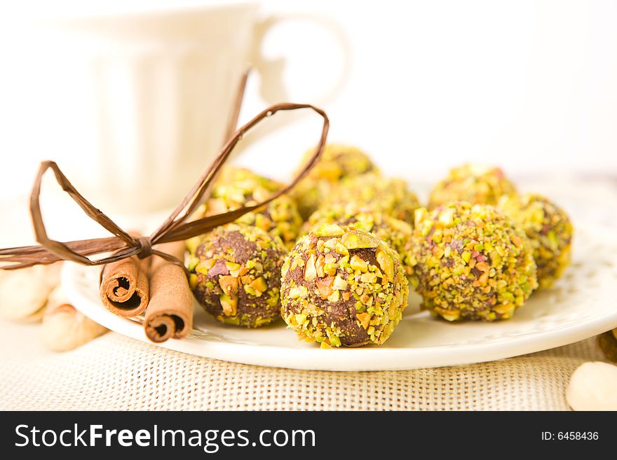 Handmade chocolates coated with pistachio