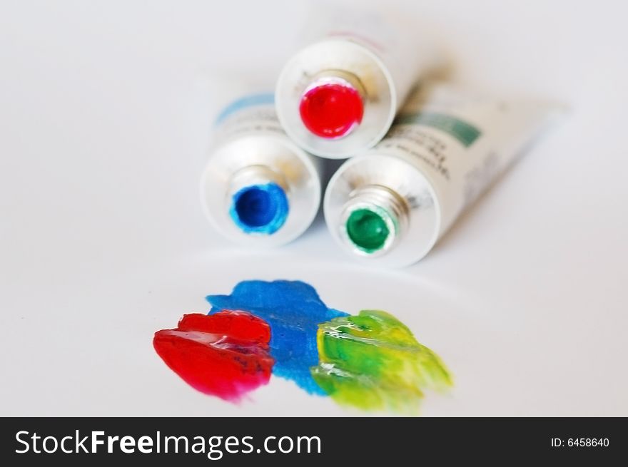 Three colors - red, blue, green - in white background