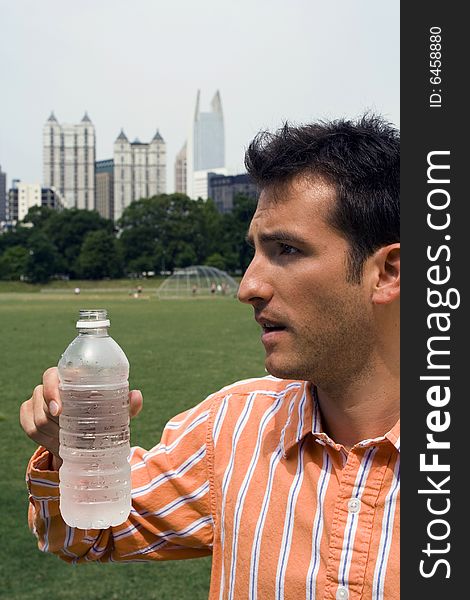 Man taking a break from drinking water